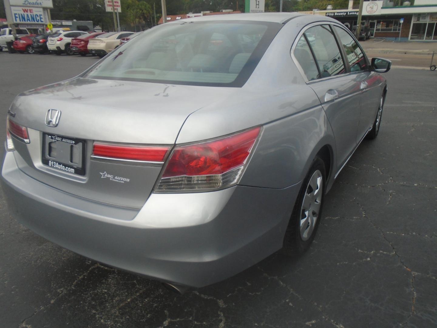 2012 Silver Honda Accord LX Sedan AT (1HGCP2F34CA) with an 2.4L L4 DOHC 16V engine, 5-Speed Automatic transmission, located at 6112 N Florida Avenue, Tampa, FL, 33604, (888) 521-5131, 27.954929, -82.459534 - Photo#3